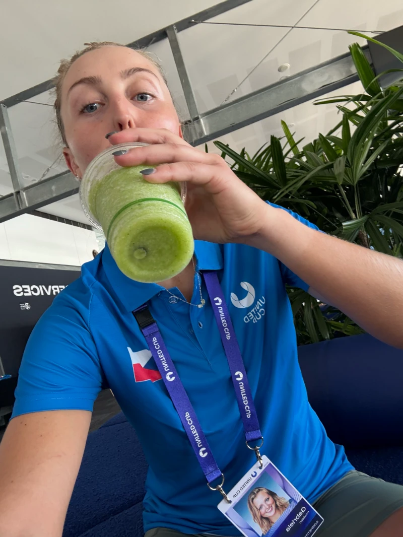 Gabriela at United Cup drinking a green smoothie